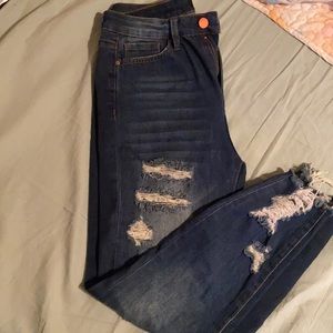 Distressed jeans worn twice